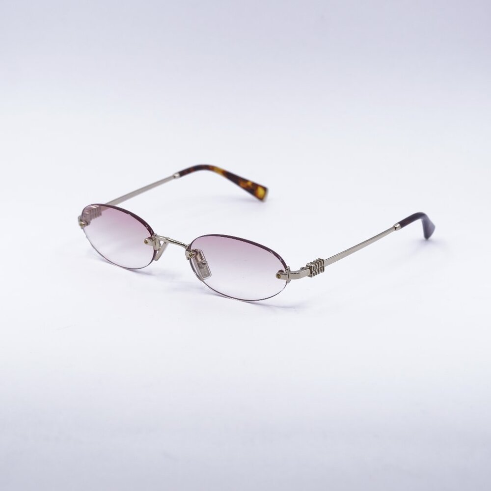 Miu Miu MUA54S ZVN70O Sunglasses Pale Gold Oval Frame, Pink Lenses